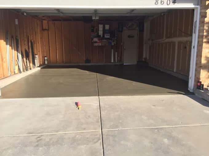 A freshly poured garage floor slab