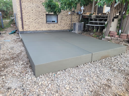 A new back patio slab photographed a few hours after it was finished