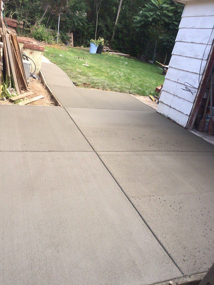 A side drive running back along a house to the garage