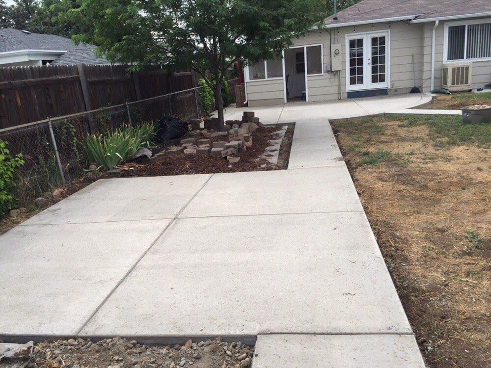 A backyard walkway and patio poured as one run to the back door